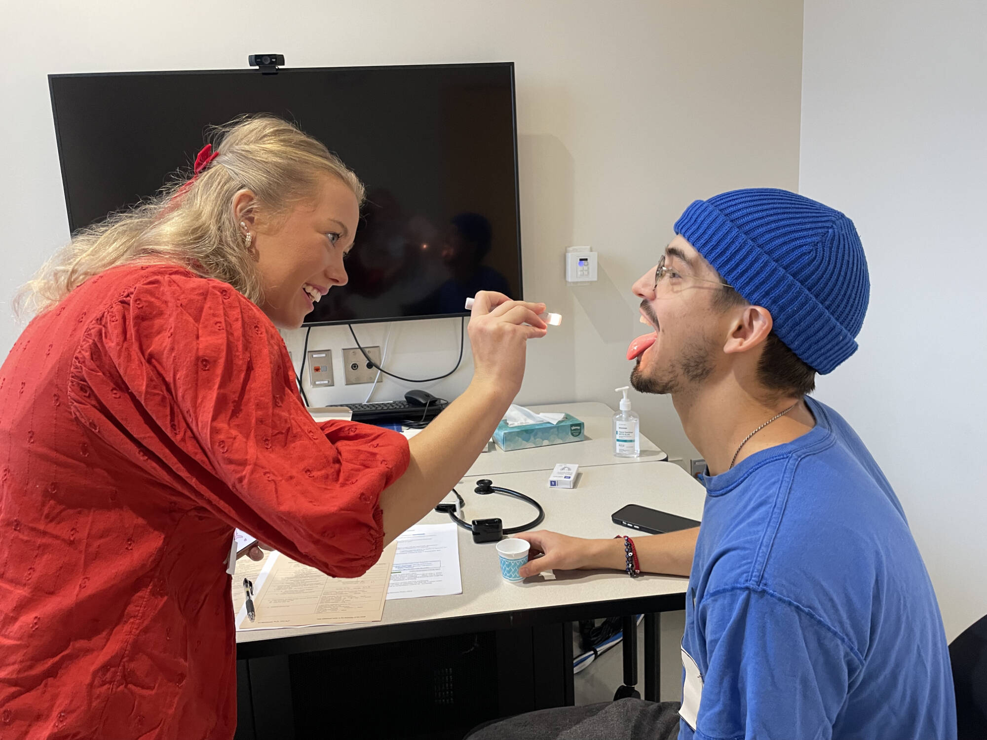 students preforming swallowing tests